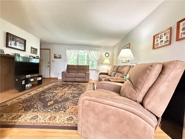 a view of a living room with furniture