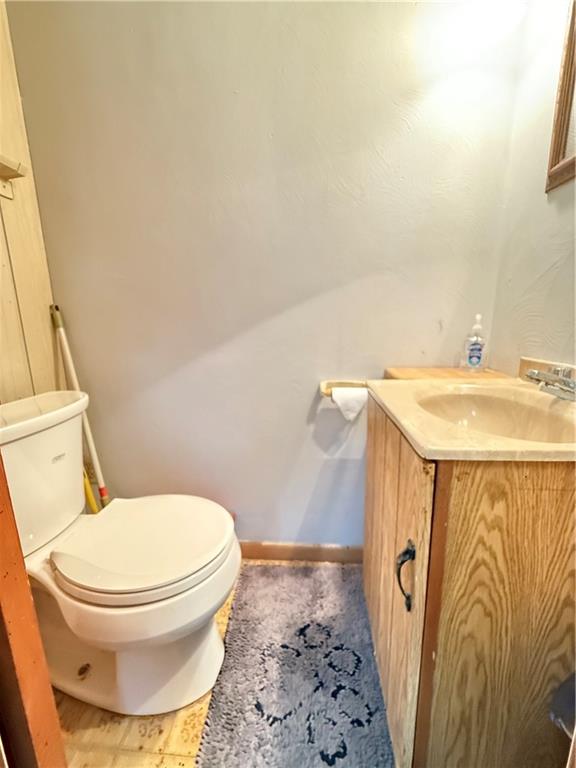 558 Clay Furnace Road Sharpsville, PA 16150 - Photo 40 of 49 a white toilet sitting next to a bathroom sink