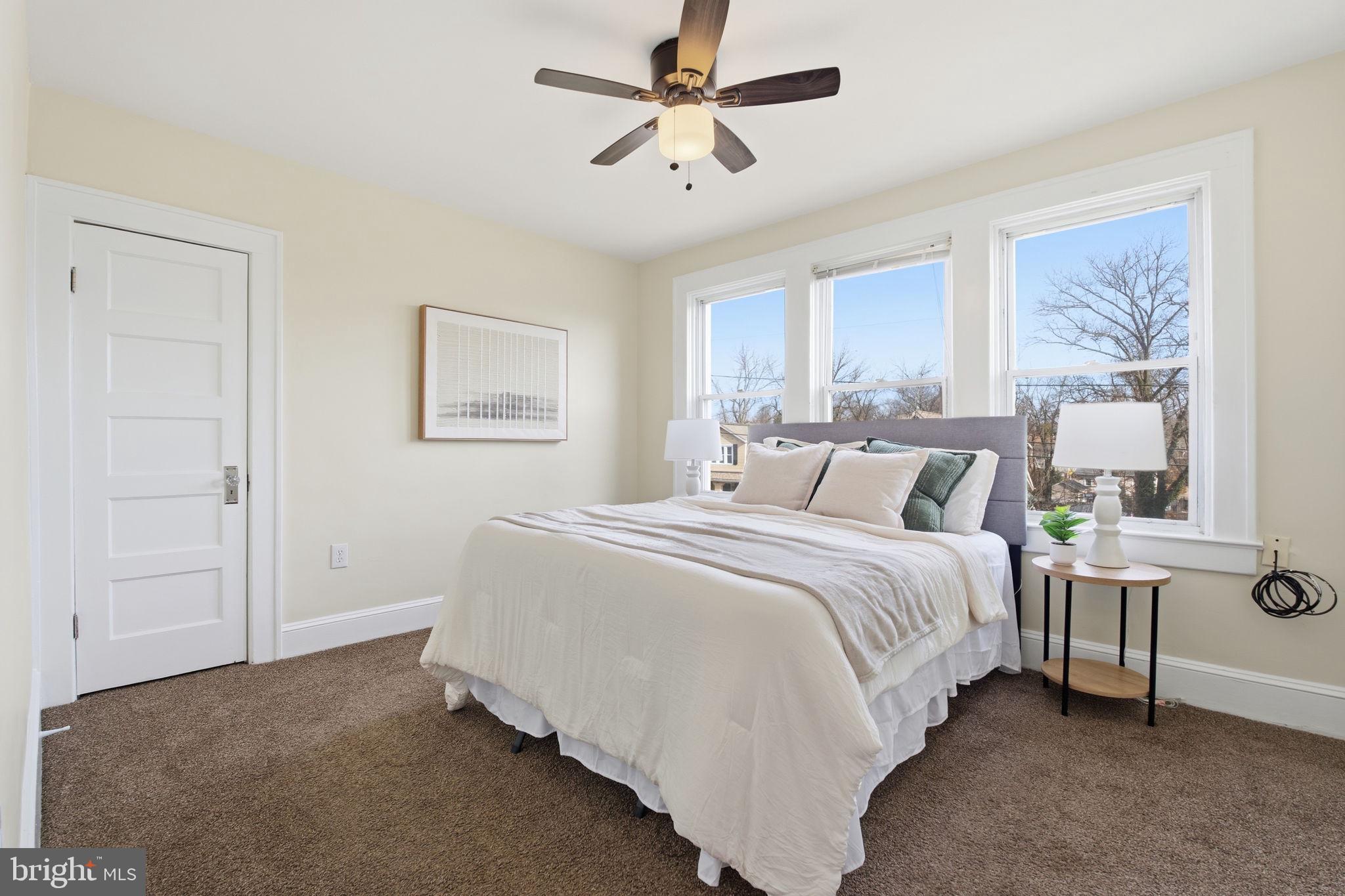 2803 Berwick Avenue Baltimore, MD 21234 - Photo 15 of 25 a bedroom with a bed and a window