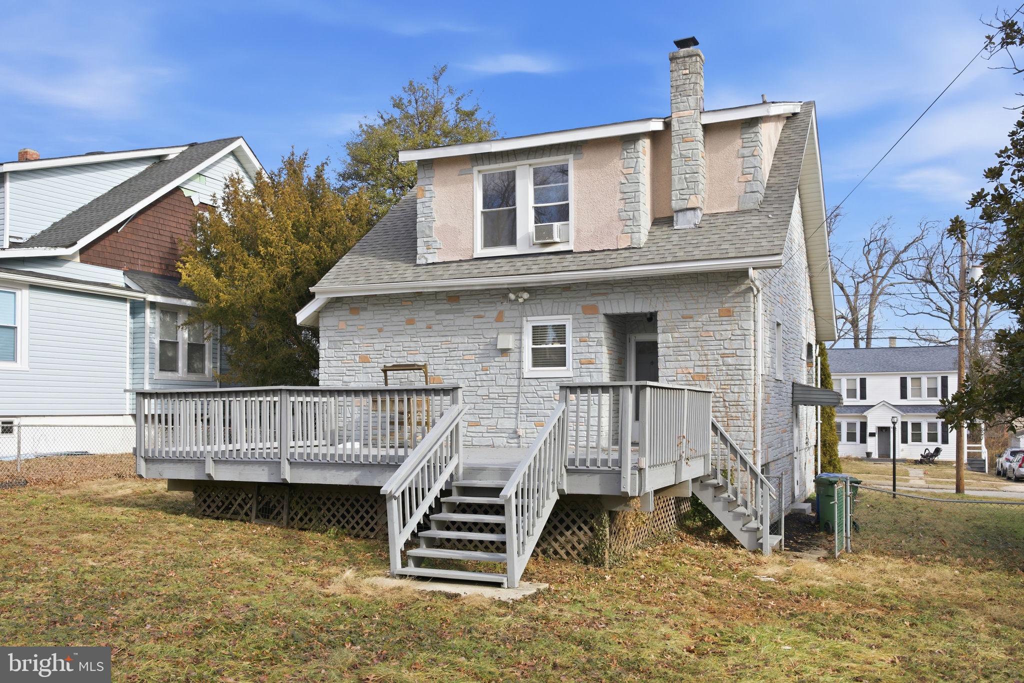 2803 Berwick Avenue Baltimore, MD 21234 - Photo 24 of 25 a view of a house with wooden deck front of house