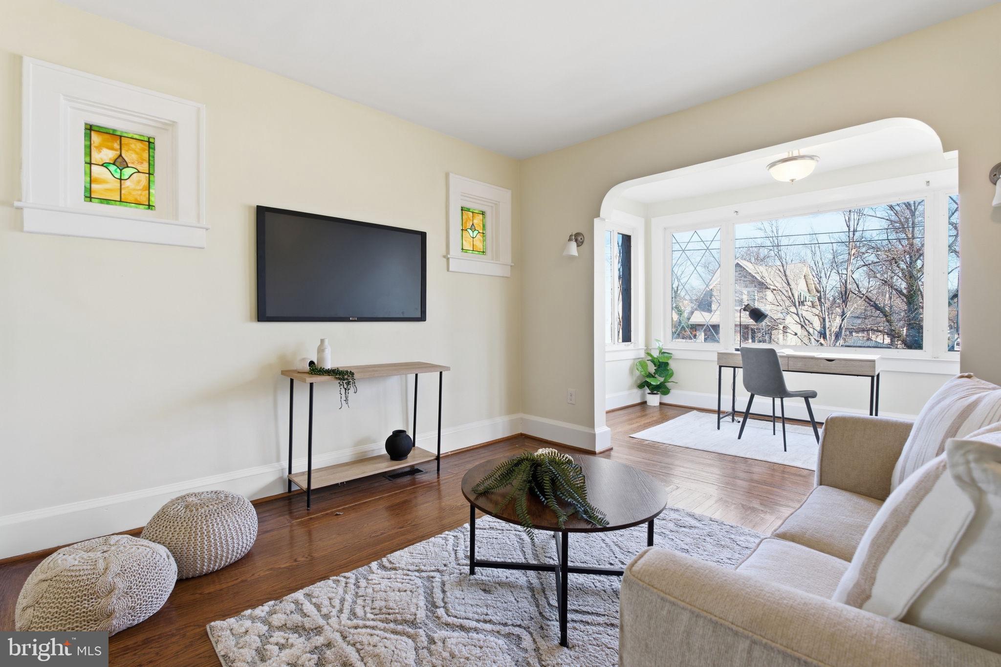 2803 Berwick Avenue Baltimore, MD 21234 - Photo 3 of 25 a living room with furniture and a flat screen tv