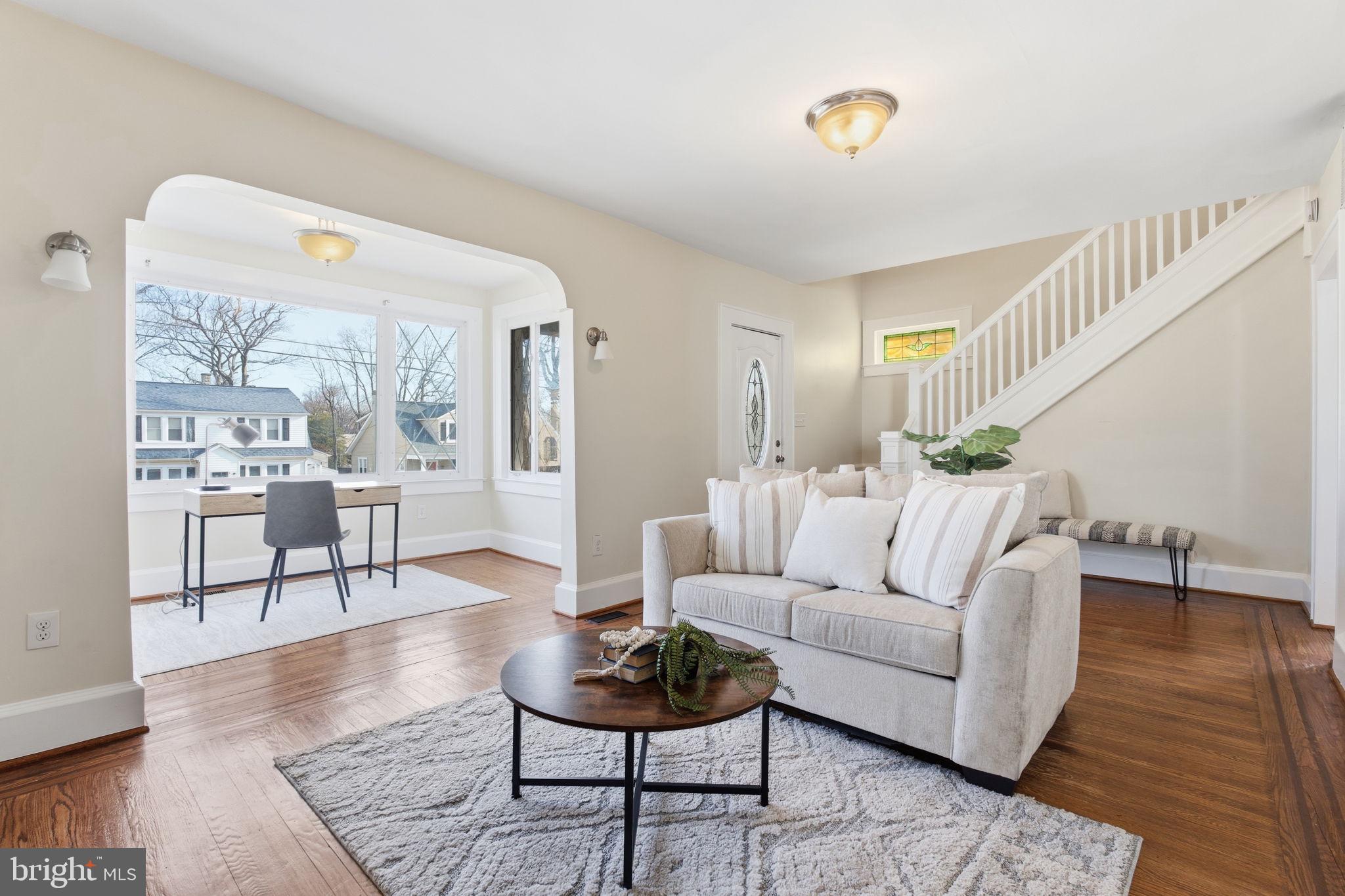 2803 Berwick Avenue Baltimore, MD 21234 - Photo 4 of 25 a living room with furniture and a rug