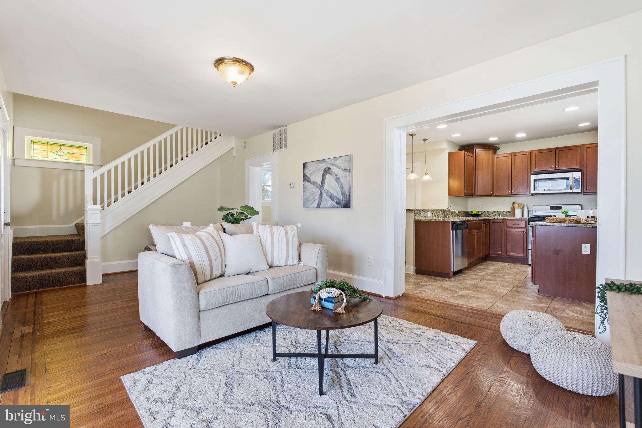 2803 Berwick Avenue Baltimore, MD 21234 - Photo 5 of 25 a living room with furniture and wooden floor