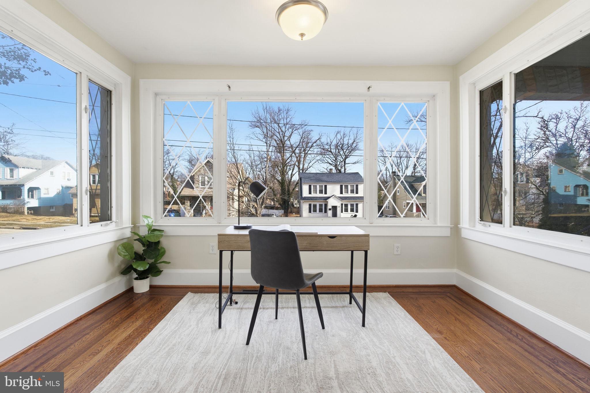 2803 Berwick Avenue Baltimore, MD 21234 - Photo 6 of 25 a view of a dining room with furniture and wooden floor