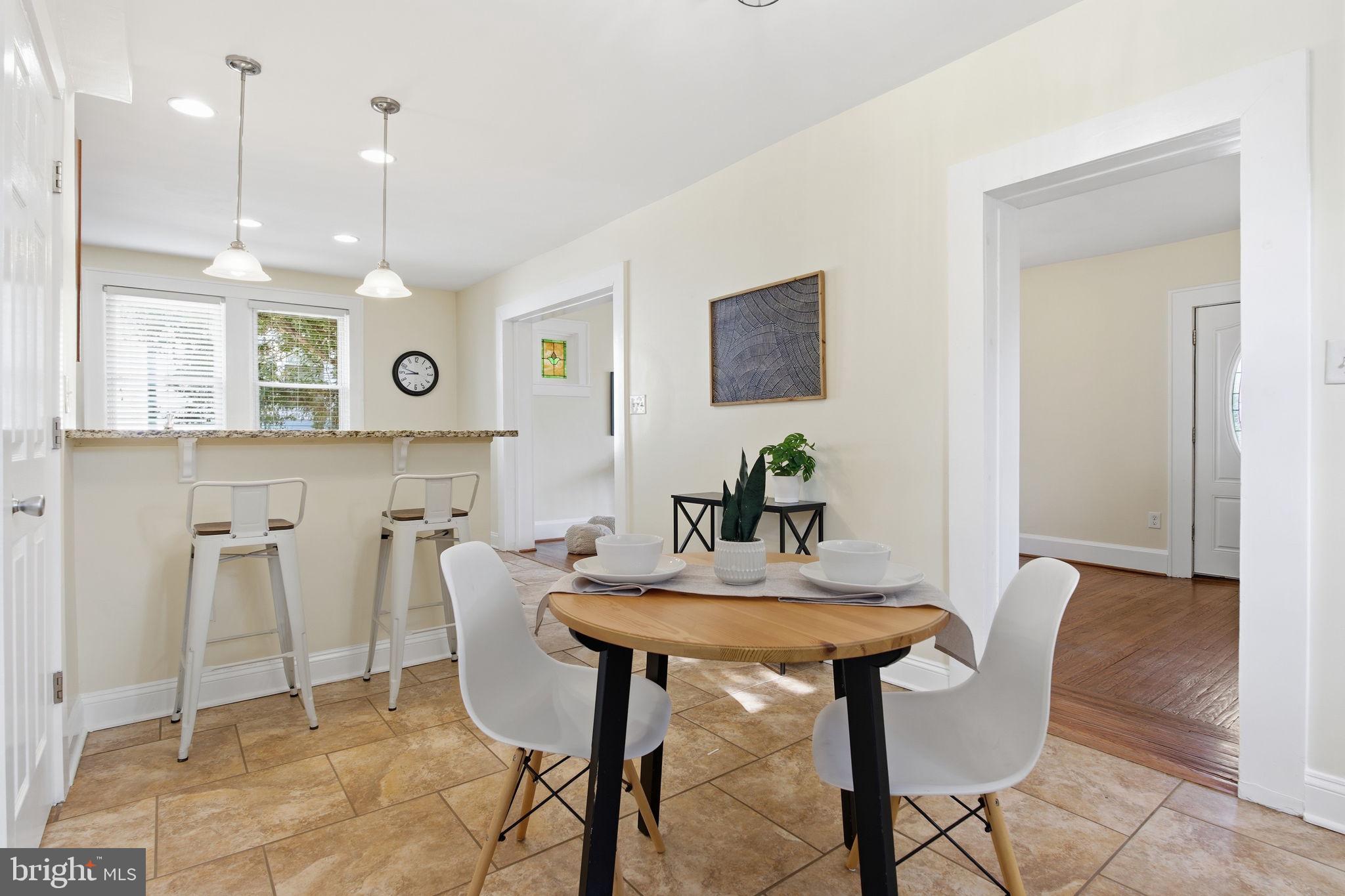 2803 Berwick Avenue Baltimore, MD 21234 - Photo 10 of 25 a view of a dining room with furniture and wooden floor