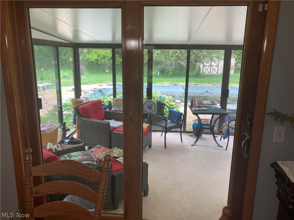 1449 Vermilion Road Vermilion, OH 44089 - Photo 4 of 21 Patio Sun Room with Sliding Door Windows
