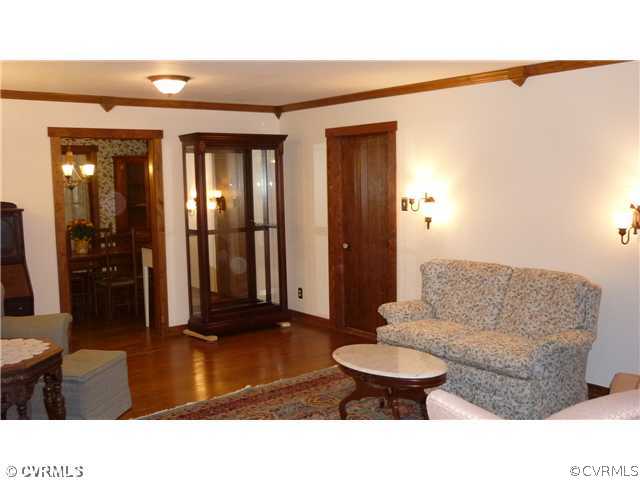2018 Esquire Road Richmond, VA 23235 - Photo 3 of 7 a living room with furniture and a large window