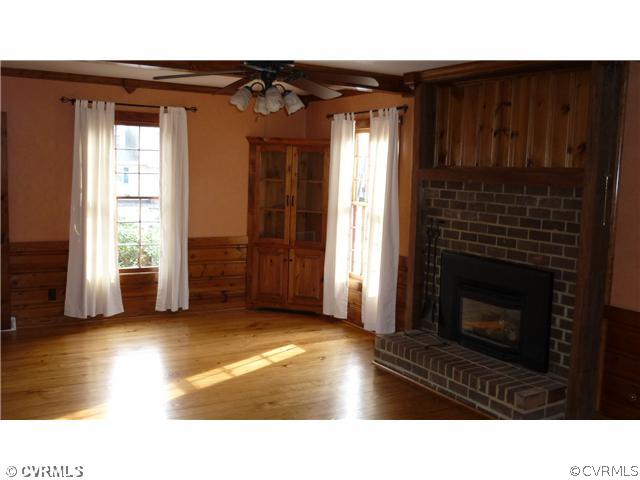 2018 Esquire Road Richmond, VA 23235 - Photo 7 of 7 a black and white photo of a fireplace