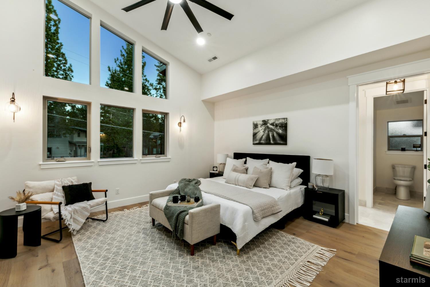 2051 Nez Perce Drive South Lake Tahoe, CA 96150 - Photo 24 of 40 a bed room with a bed and a large window