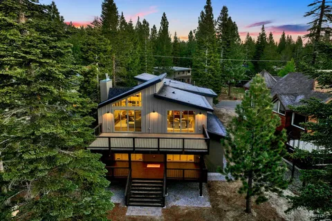 a view of a bench in a backyard