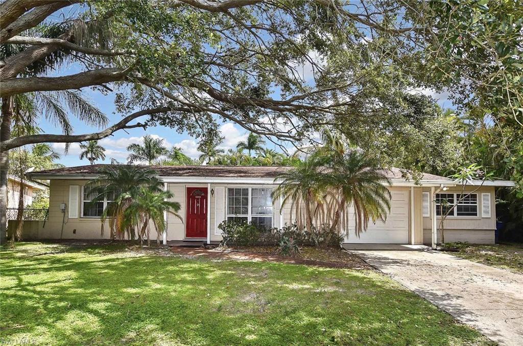 1431 Collins Road Fort Myers, FL 33919 - Photo 3 of 30 a view of a house with a yard