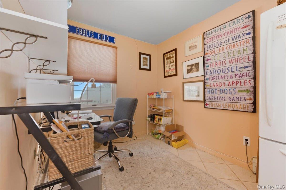 15 Lake Gilead Road Carmel, NY 10512 - Photo 11 of 27 a view of a workspace with furniture and a window