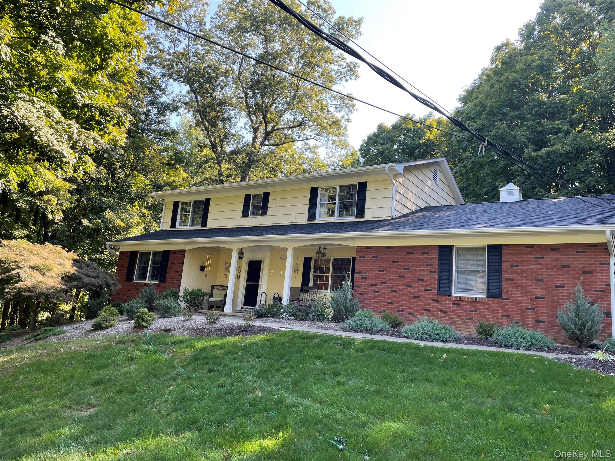 15 Lake Gilead Road Carmel, NY 10512 - Photo 25 of 27 a front view of a house with a yard