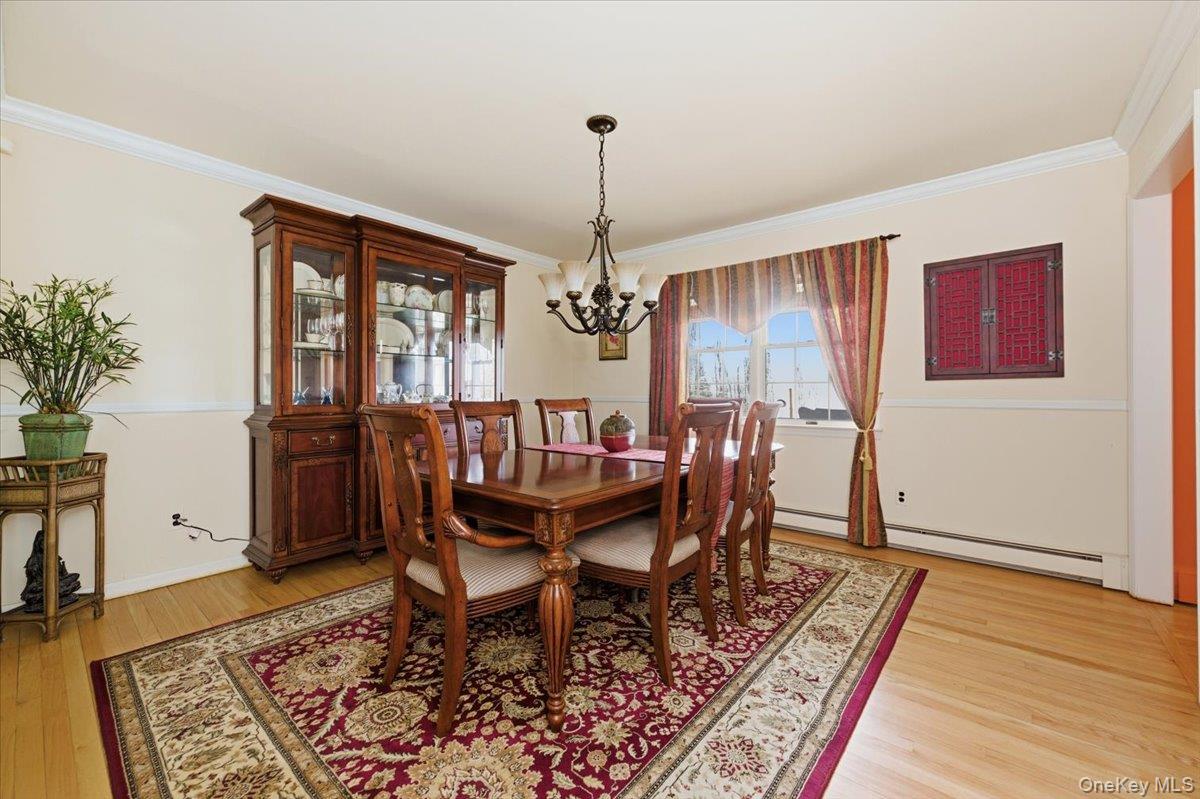 15 Lake Gilead Road Carmel, NY 10512 - Photo 6 of 27 a dining room with furniture window and wooden floor