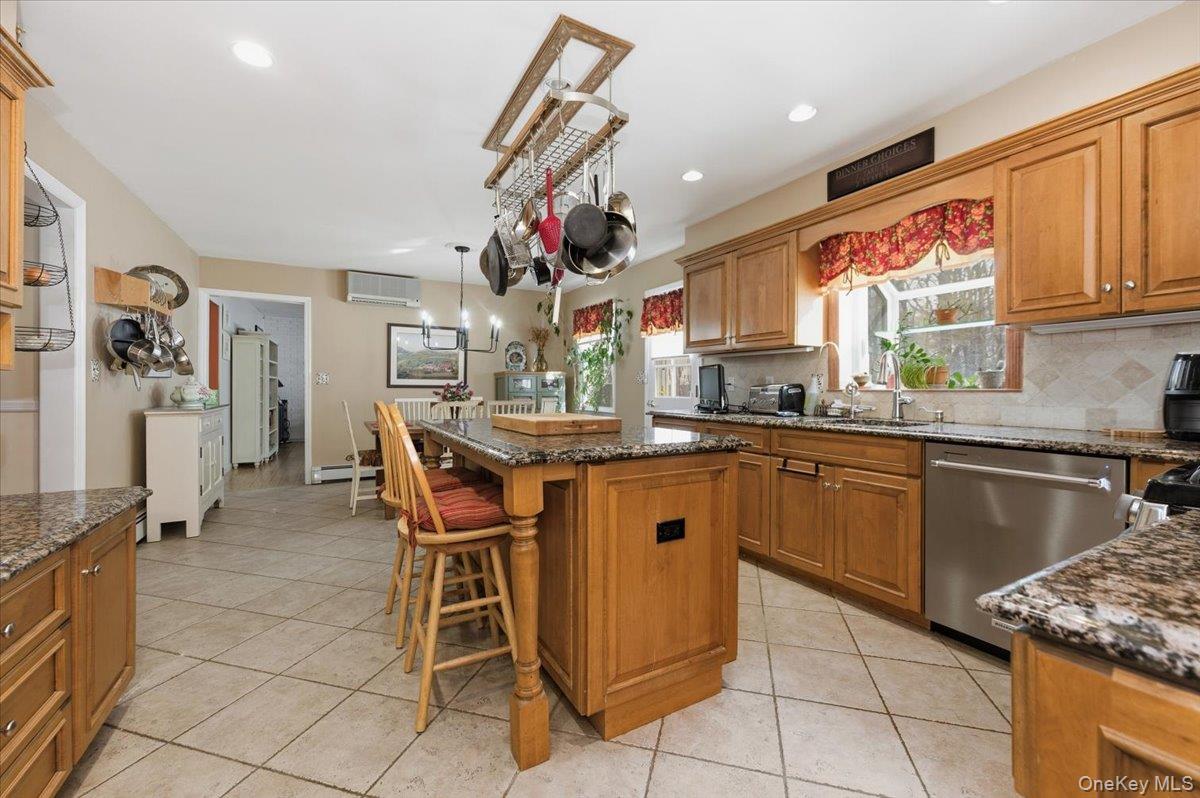 15 Lake Gilead Road Carmel, NY 10512 - Photo 8 of 27 a kitchen with stainless steel appliances granite countertop sink stove top oven and cabinets