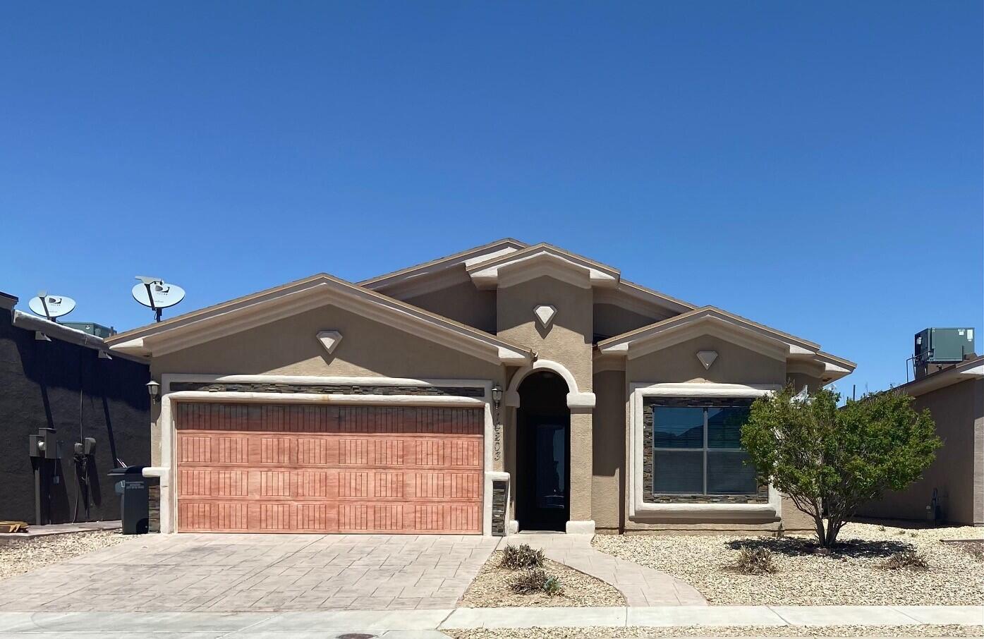 14203 Rattler Point Drive El Paso, TX 79938 - Photo 1 of 1 a front view of a house