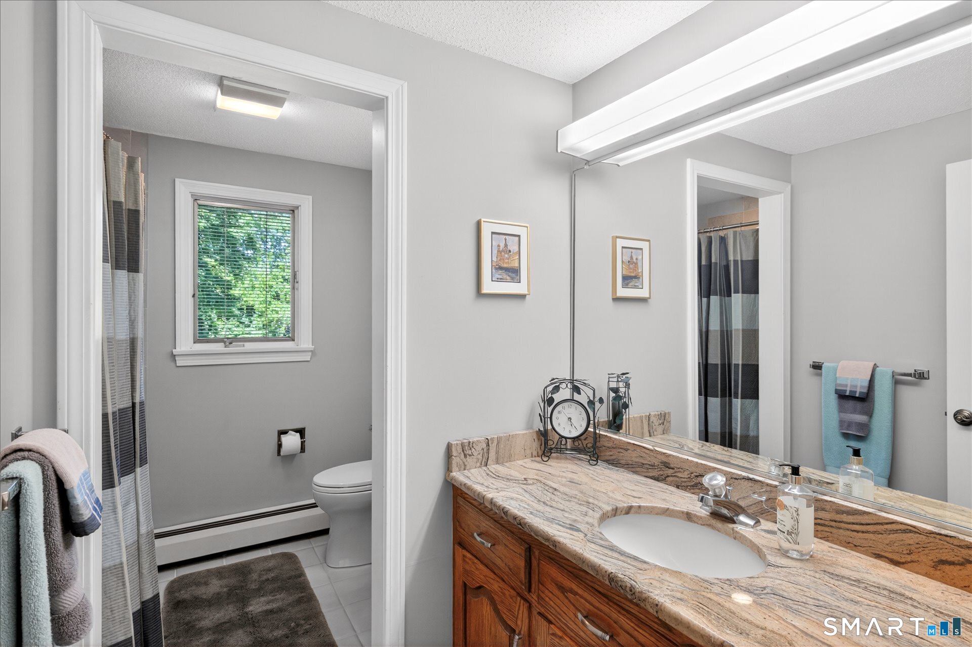 5 Shingle Mill Drive Canton, CT 06019 - Photo 30 of 38 a bathroom with a granite countertop sink and a mirror