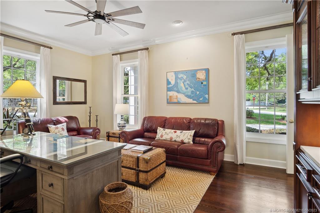 9 Pineapple Lane Stuart, FL 34996 - Photo 16 of 33 a living room with furniture and a window