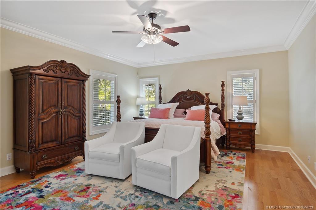 9 Pineapple Lane Stuart, FL 34996 - Photo 17 of 33 a living room with furniture and a baby crib