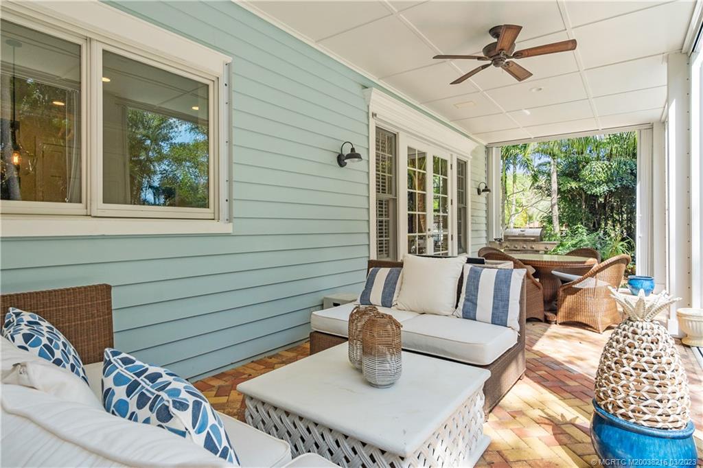 9 Pineapple Lane Stuart, FL 34996 - Photo 27 of 33 a living room with furniture and a window