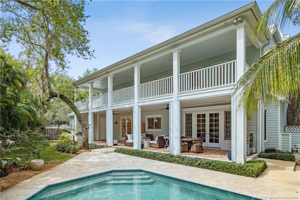 9 Pineapple Lane Stuart, FL 34996 - Photo 30 of 33 a front view of a house with a yard