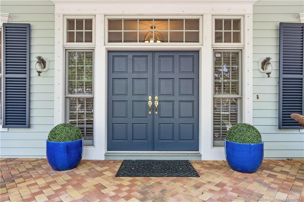 9 Pineapple Lane Stuart, FL 34996 - Photo 5 of 33 a view of outdoor space with plants