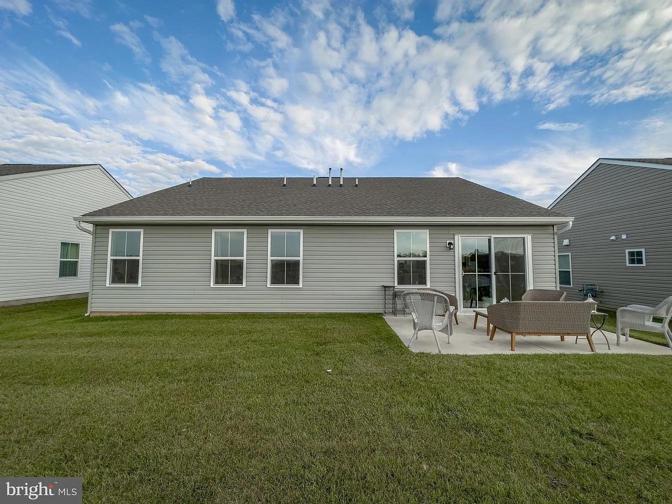18 Bustleton Millville, NJ 08332 - Photo 11 of 19 a front view of house with yard and seating space