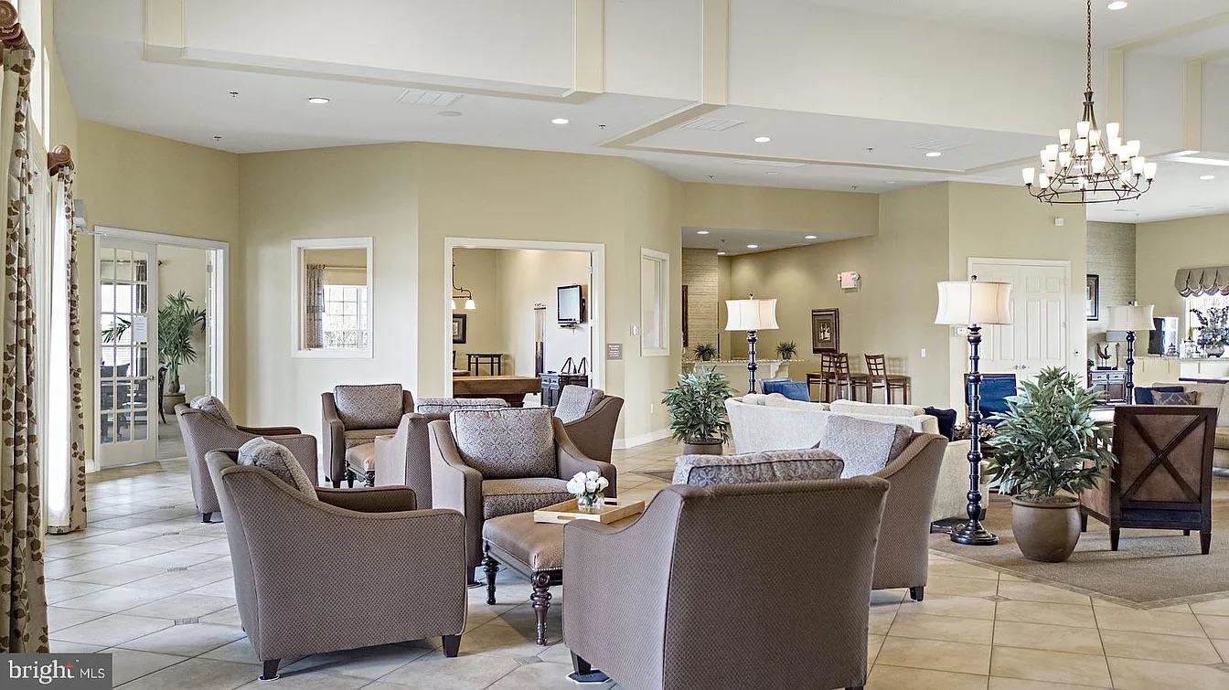 18 Bustleton Millville, NJ 08332 - Photo 15 of 19 a living room with furniture and a chandelier