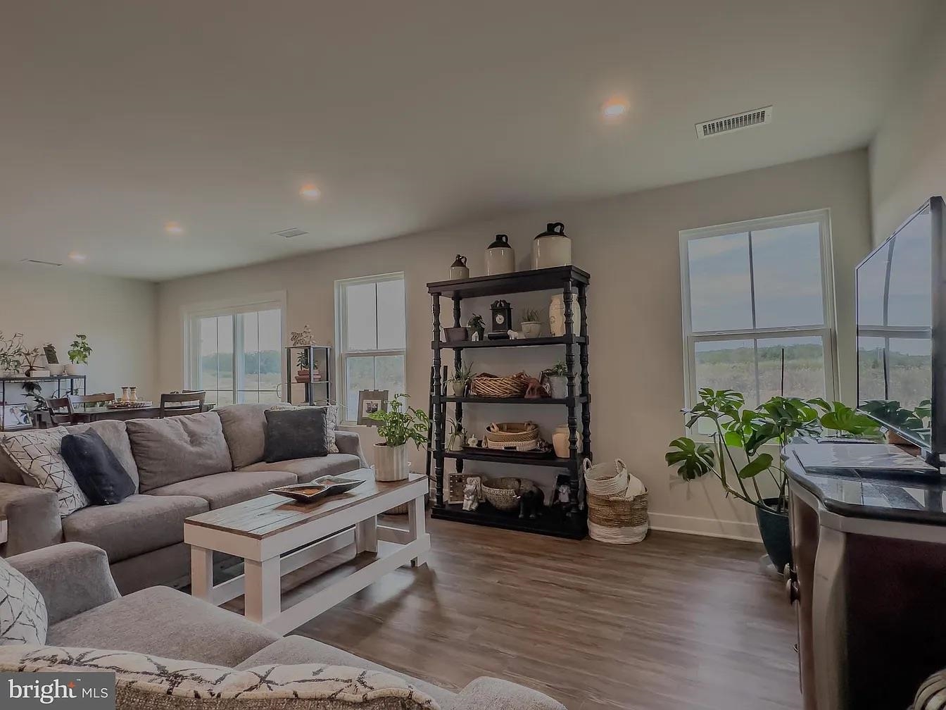 18 Bustleton Millville, NJ 08332 - Photo 5 of 19 a living room with furniture and book shelf