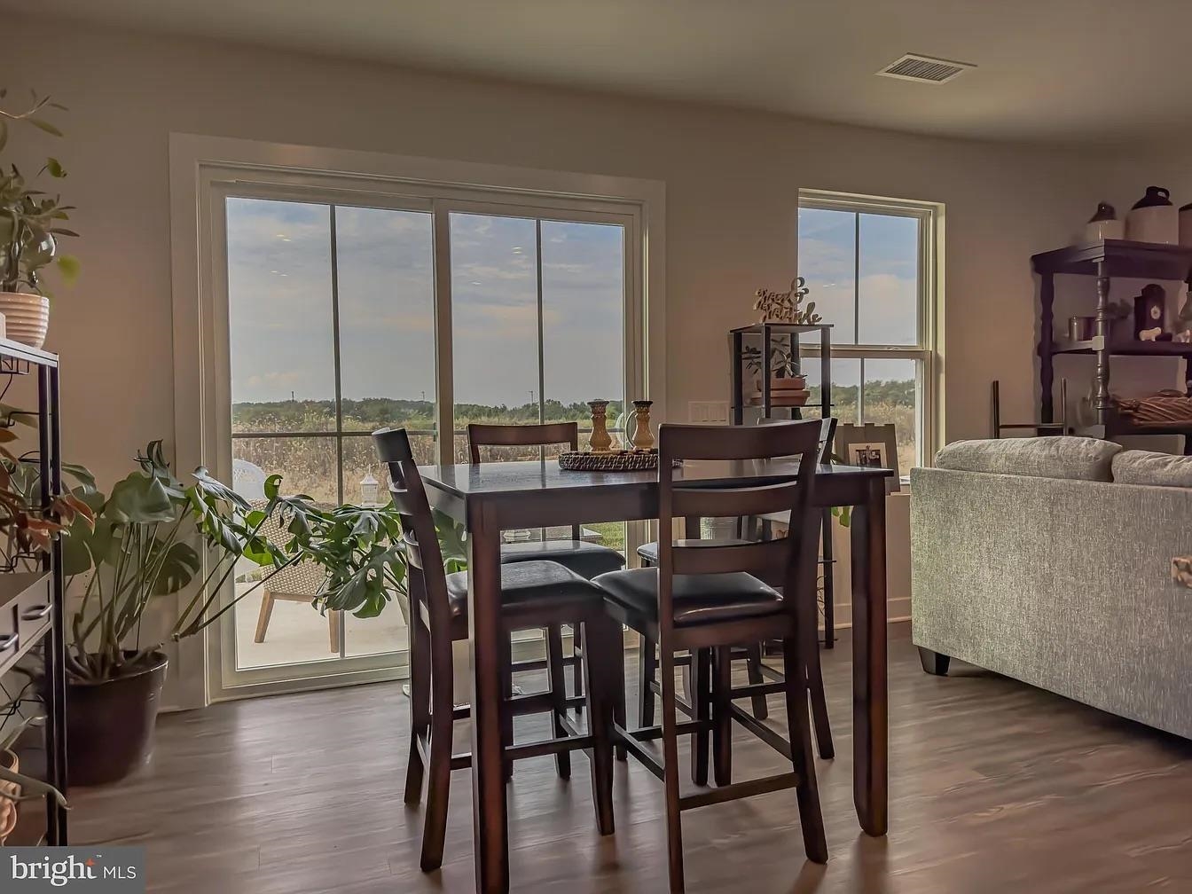 18 Bustleton Millville, NJ 08332 - Photo 6 of 19 a view of a dining room with furniture and wooden floor