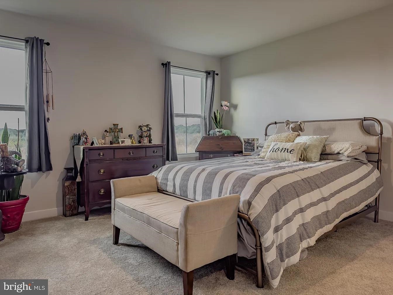 18 Bustleton Millville, NJ 08332 - Photo 7 of 19 a spacious bedroom with two beds and a couch