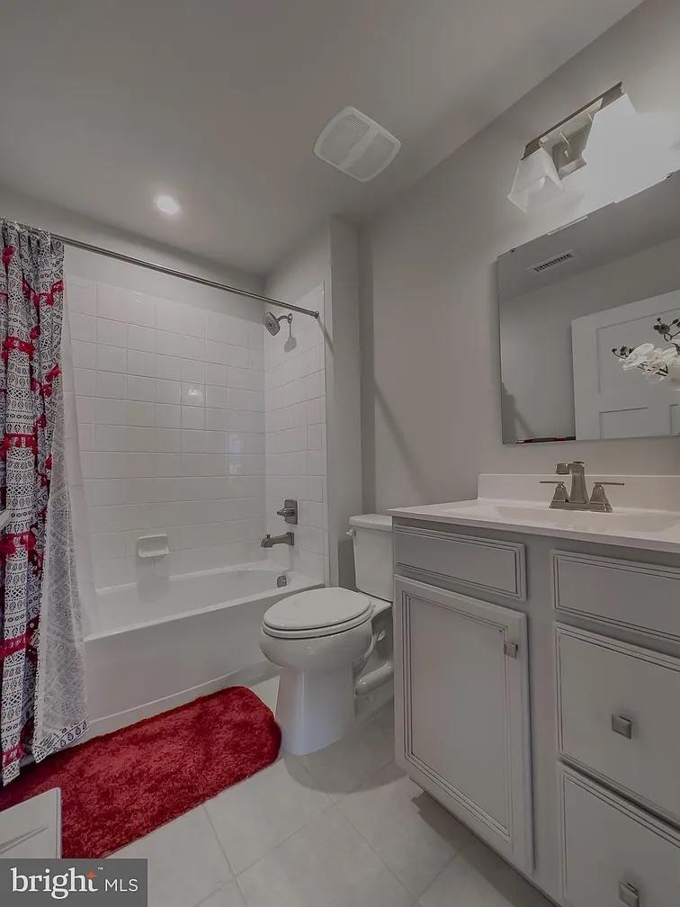 18 Bustleton Millville, NJ 08332 - Photo 10 of 19 a bathroom with a bathtub shower sink vanity and toilet
