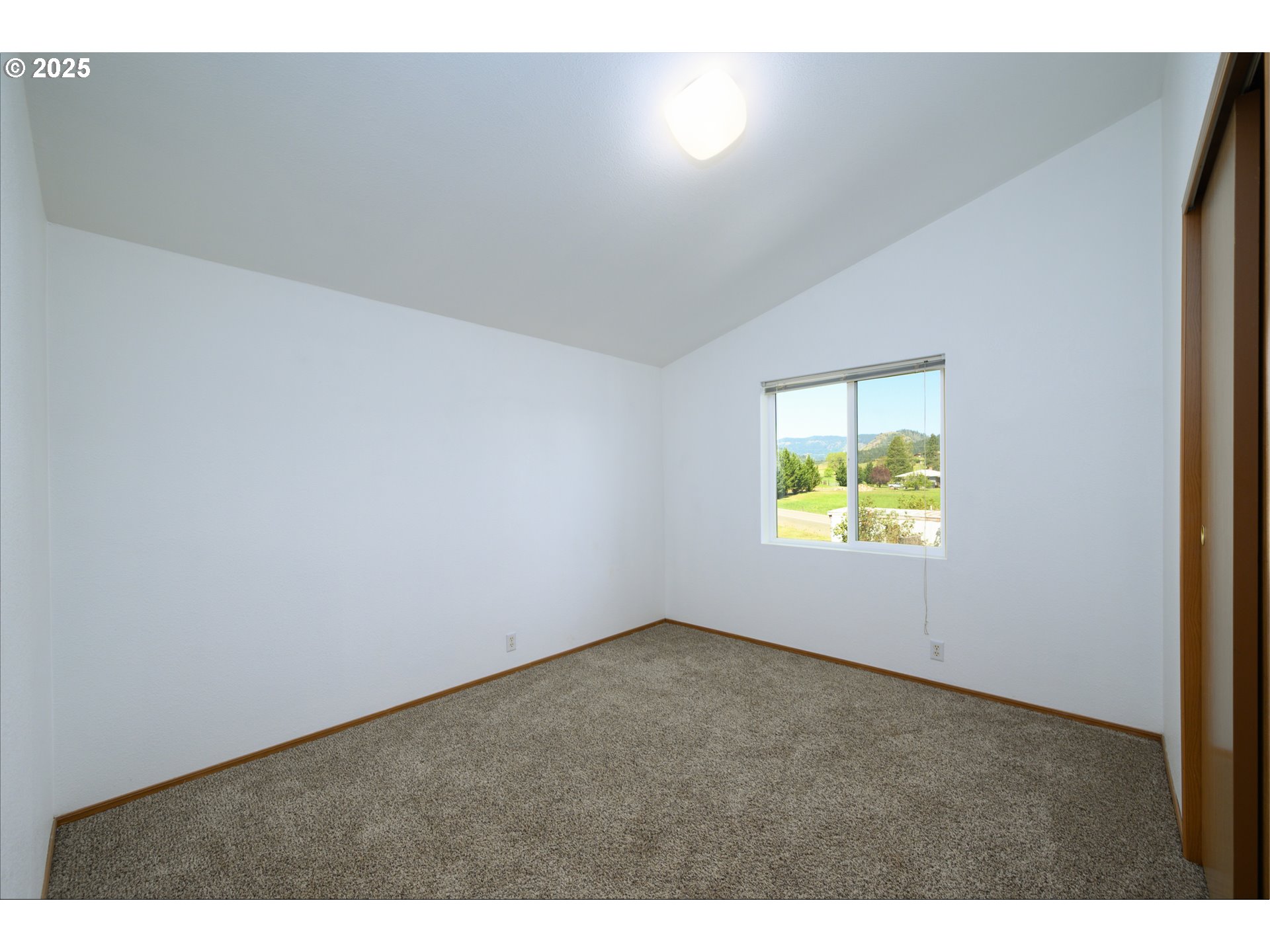 425 Moon Hill Road Tenmile, OR 97481 - Photo 34 of 42 a view of an empty room with a window
