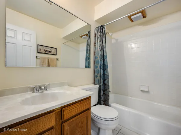 a bathroom with a sink toilet and a bathtub