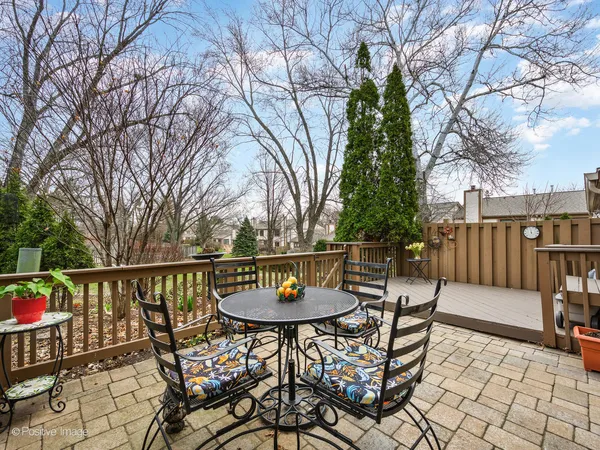 a view of a chairs and tables on the deck