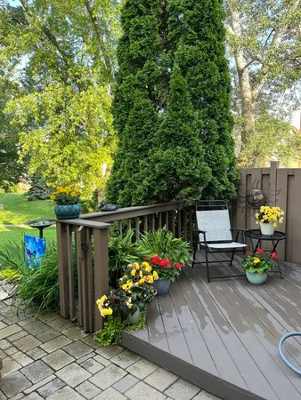 a garden view with a sitting space