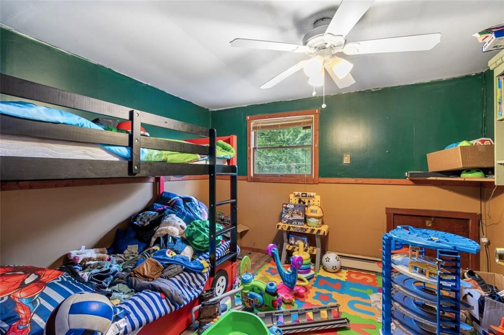 368 Echo Ridge Road Apollo, PA 15613 - Photo 13 of 24 a room with lots of baby toys and wooden floor
