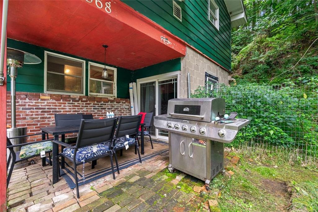 368 Echo Ridge Road Apollo, PA 15613 - Photo 21 of 24 a patio with couches fire pit and outdoor seating