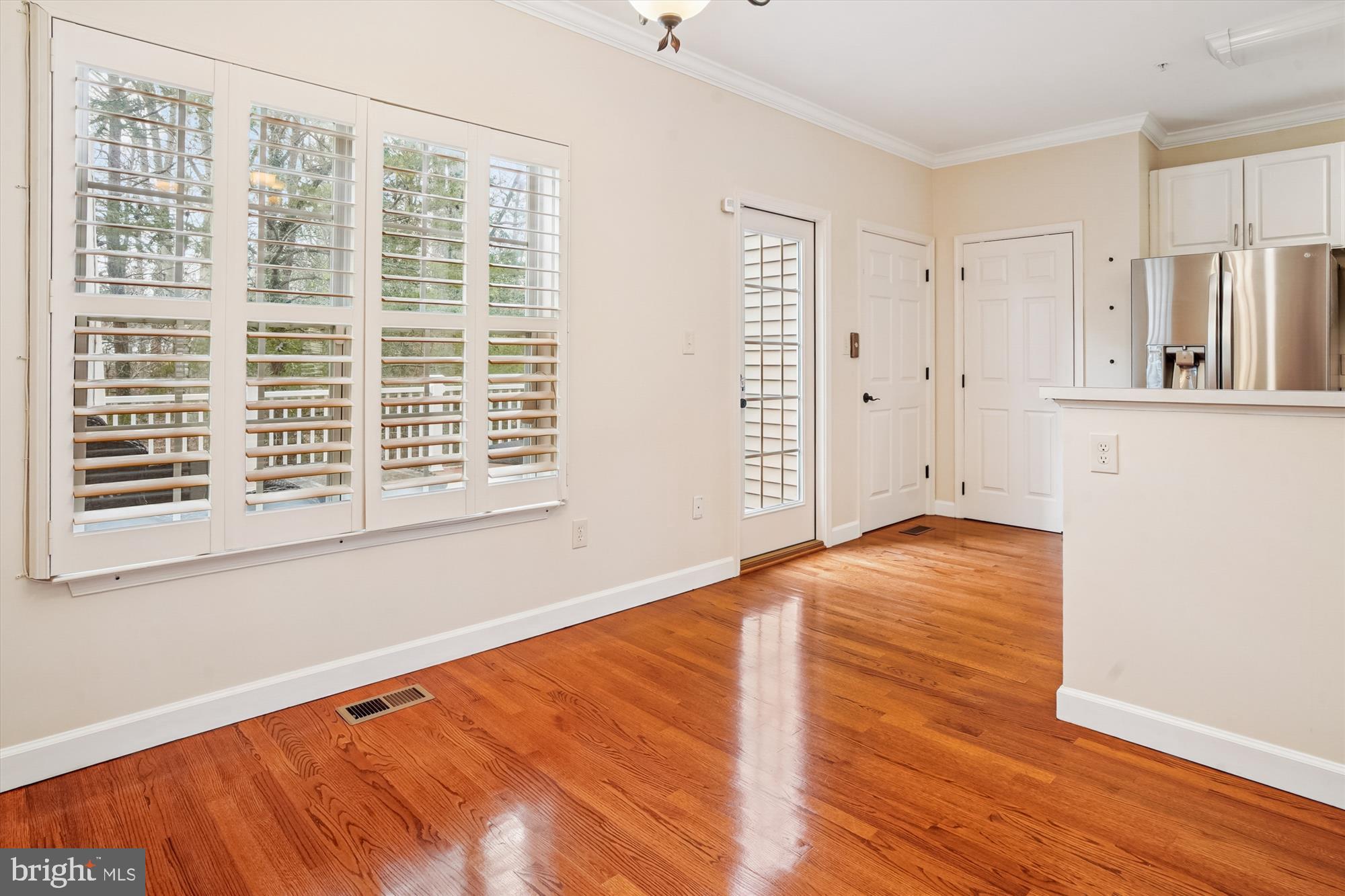 3232 Escapade Circle Riva, MD 21140 - Photo 11 of 38 a view of empty room with wooden floor and fan