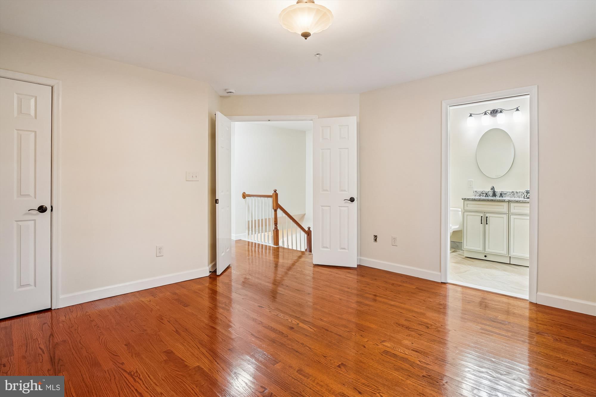 3232 Escapade Circle Riva, MD 21140 - Photo 15 of 38 a view of empty room with wooden floor