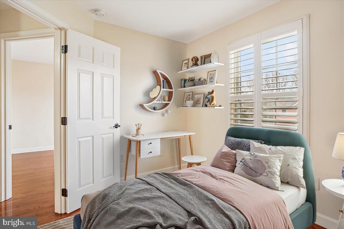 3232 Escapade Circle Riva, MD 21140 - Photo 19 of 38 a bedroom with a bed and a window