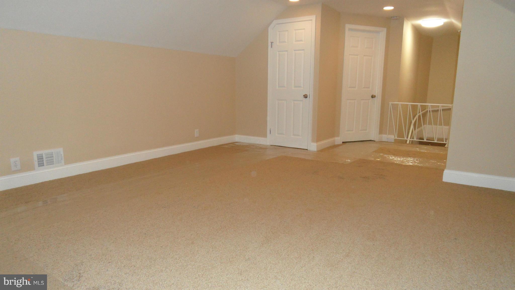 7413 Sudbrook Road Baltimore, MD 21208 - Photo 16 of 30 a view of an empty room