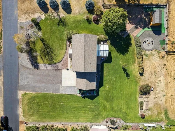 an aerial view of a house with a garden