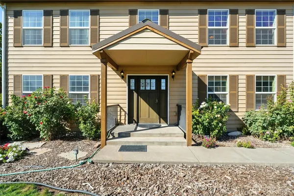 a view of yard with patio