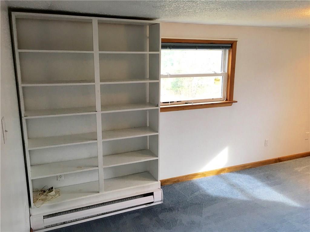 431 Hotel Road Ligonier, PA 15658 - Photo 22 of 25 How about these built in bookshelves? This large 13 x 15 Bedroom could be an amazing office too. Or it would be a super den with a sleeper sofa for guests. Perhaps it could even be a second family room space?