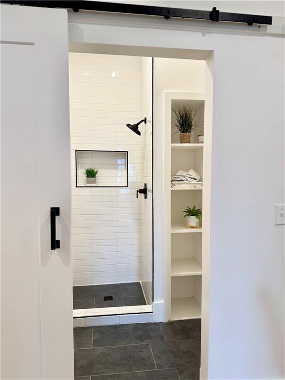 420 Wendel Road Irwin, PA 15642 - Photo 15 of 41 First floor step in shower. Barn door closure.