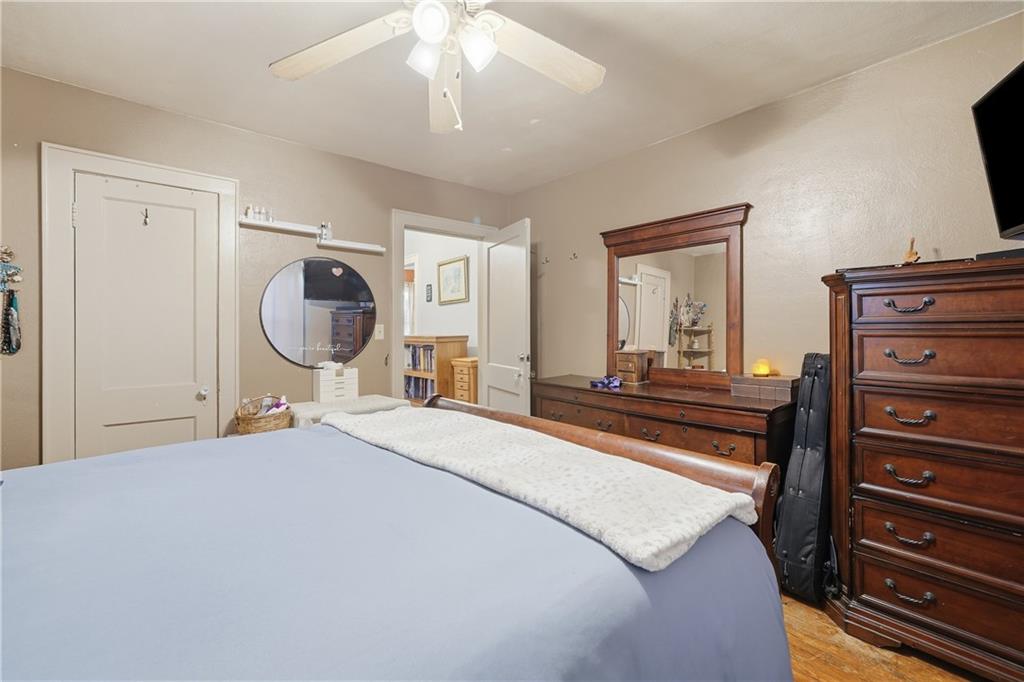 2108 Maple Avenue Southwest Rome, GA 30161 - Photo 12 of 19 a bedroom with a bed and wooden floor