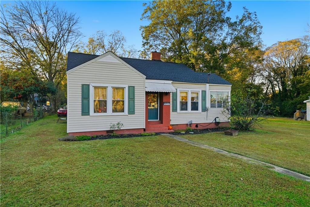 2108 Maple Avenue Southwest Rome, GA 30161 - Photo 16 of 19 a front view of house with yard and green space