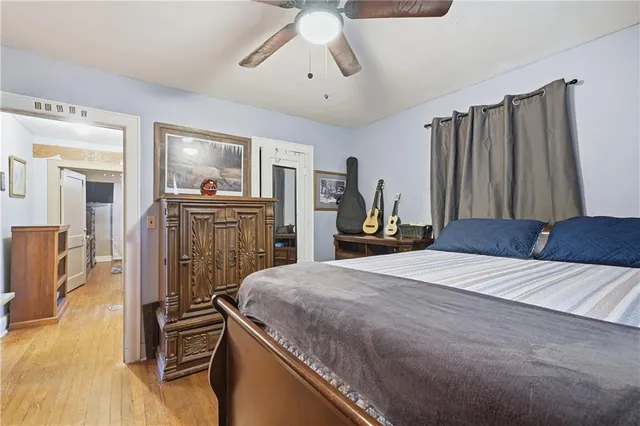 a bed room with a bed and furniture