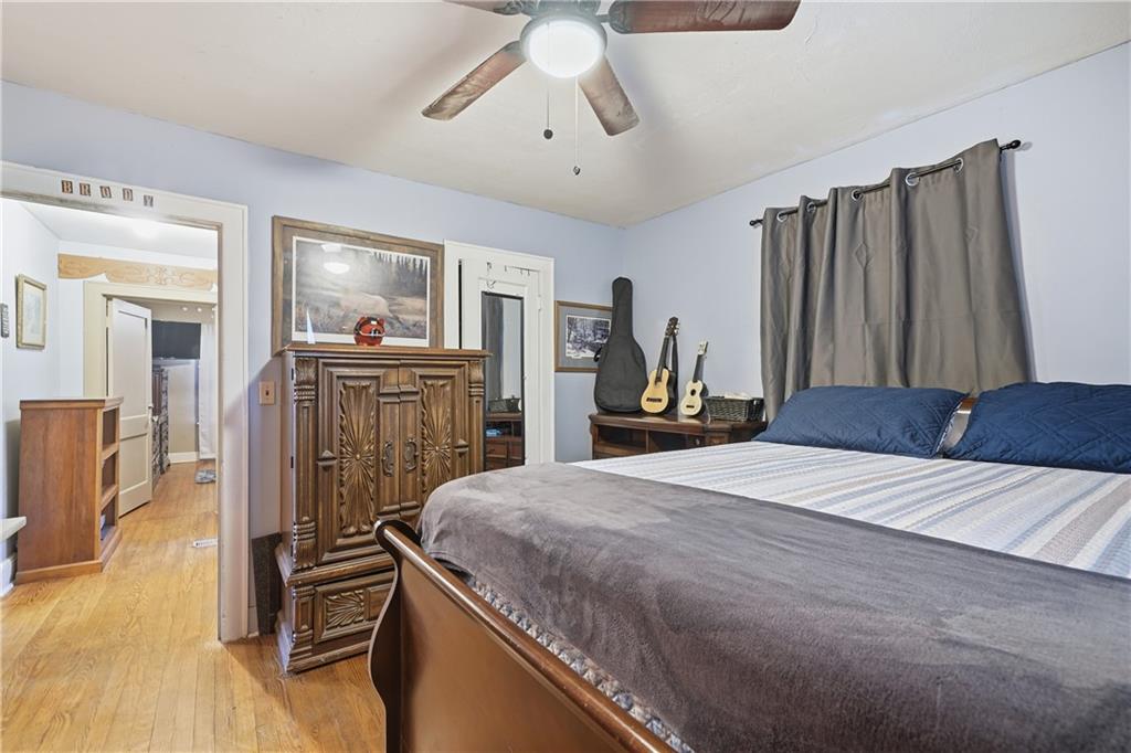 2108 Maple Avenue Southwest Rome, GA 30161 - Photo 9 of 19 a bed room with a bed and furniture